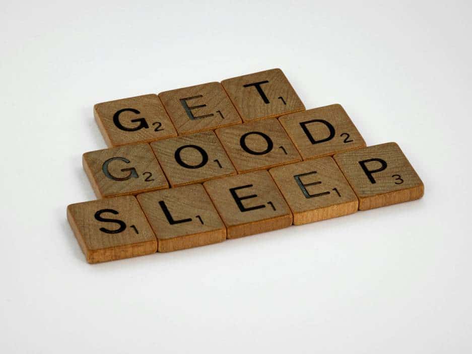 Letter blocks spelling sleep tips for better nighttime habits and an insomnia-free lifestyle