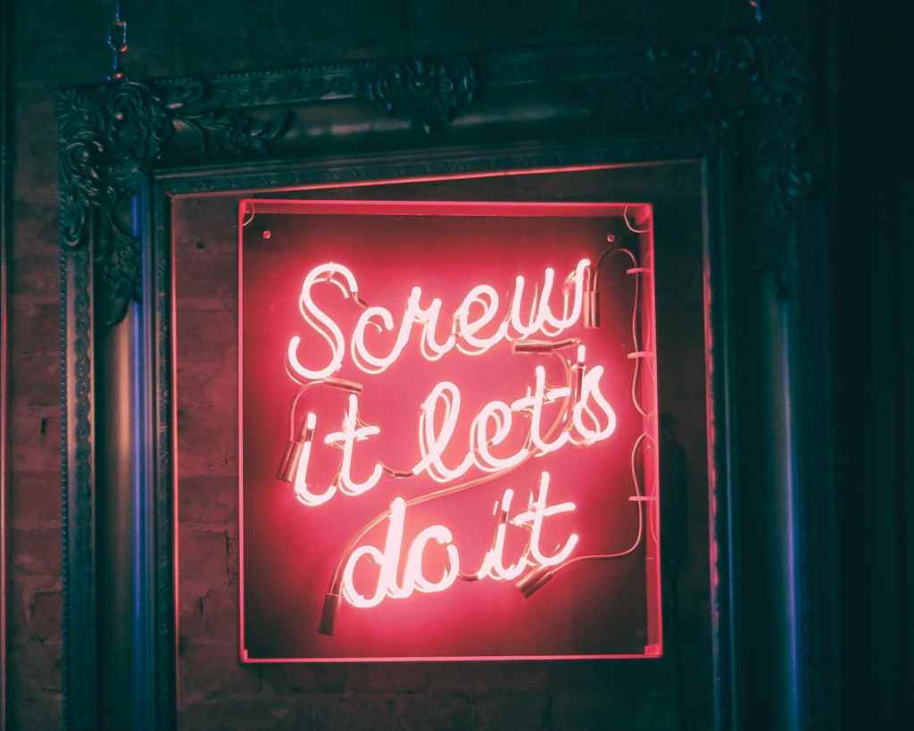 neon sign that reads: screw it, let's do it